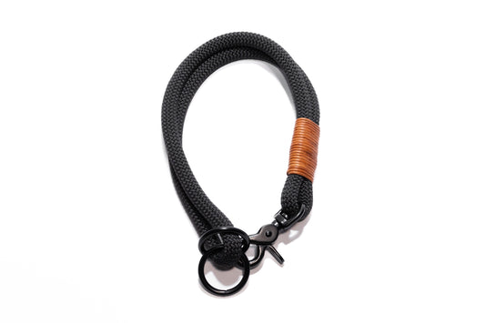Handcrafted climbing rope and leather hybrid slip dog collar. Featuring high quality black hardware, including a swivel trigger snap. Custom sizing. Cross Winds Leather.