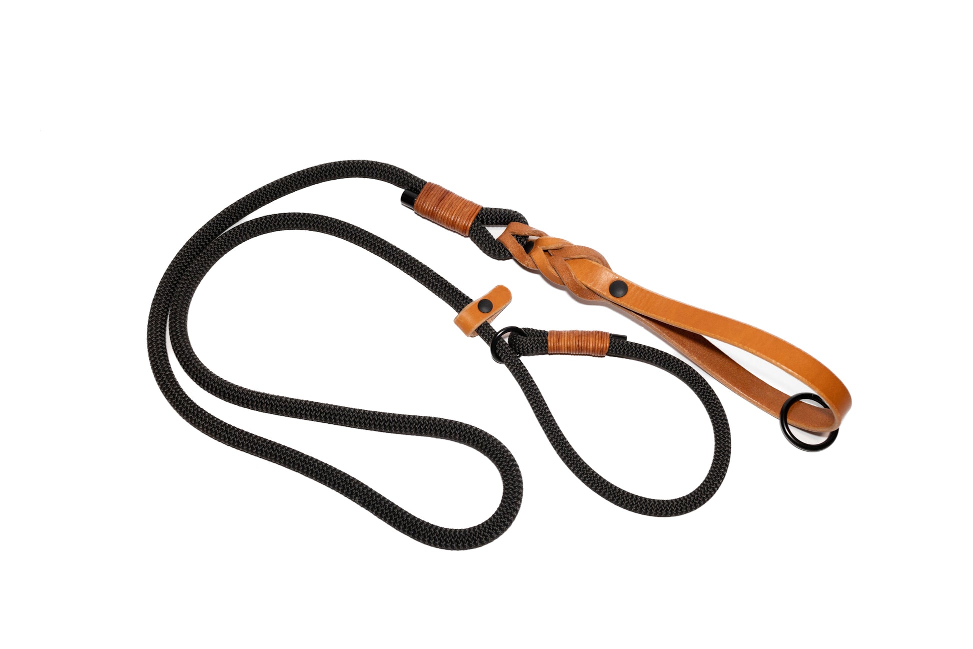 Handcrafted climbing rope and leather dog slip leash. Featuring high quality, heavy-duty black hardware. Leather Handle. Cross Winds Leather.