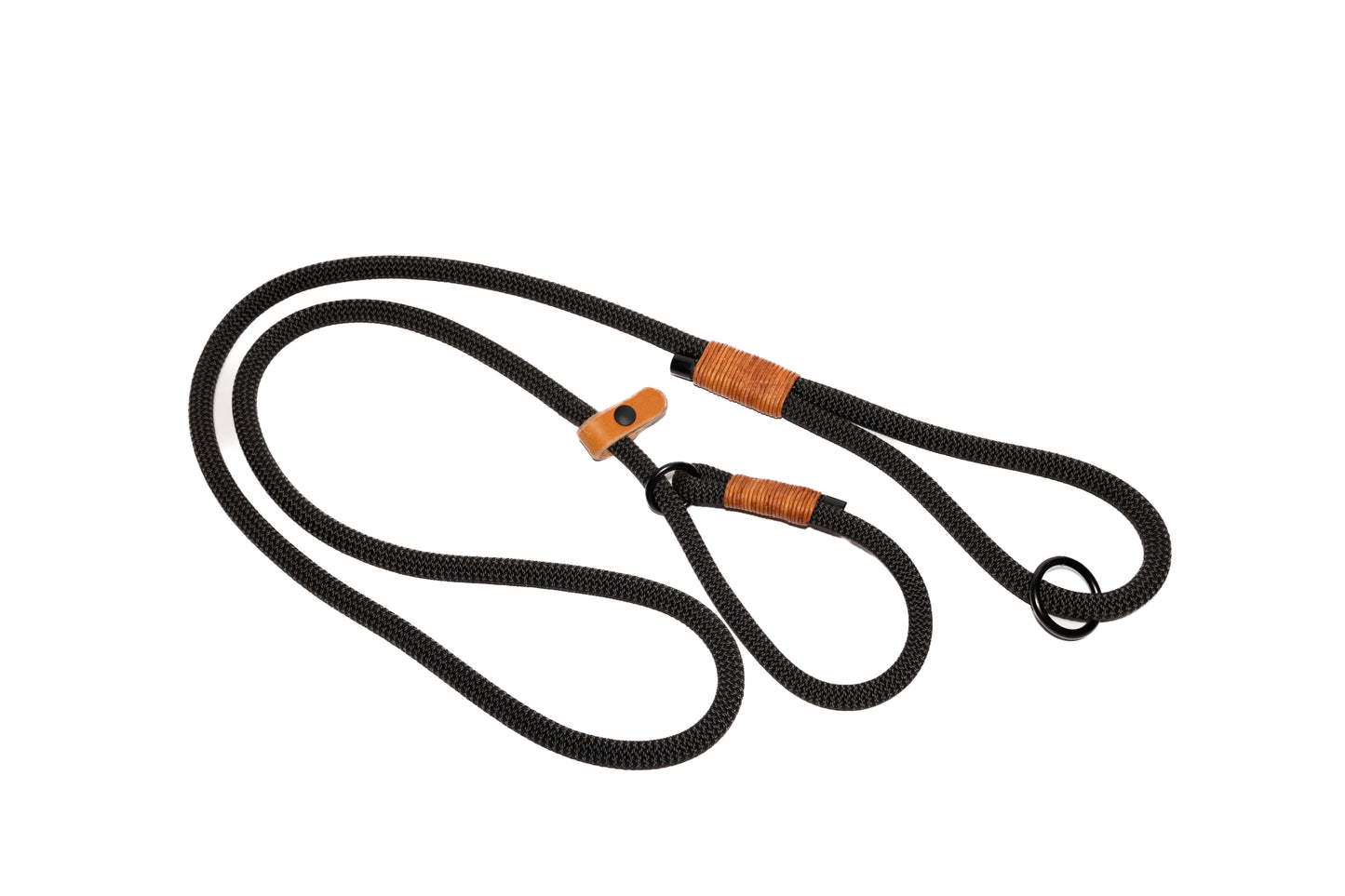 Handcrafted climbing rope and leather dog slip leash. Featuring high quality, heavy-duty black hardware. Rope Handle. Cross Winds Leather.