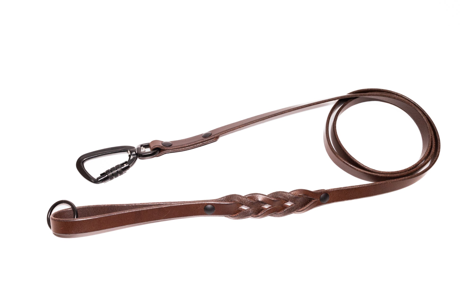 Handcrafted braided full grain leather dog leash. Featuring high quality, heavy-duty black hardware, including a swivel auto-locking carabiner. Cross Winds Leather.