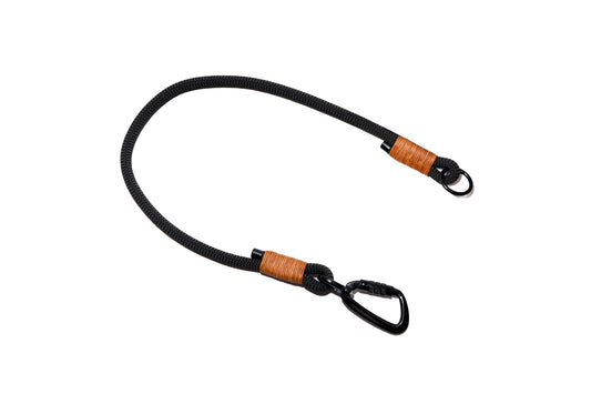Handcrafted climbing rope and leather dog leash extension. Featuring high quality, heavy-duty black hardware, including a swivel auto-locking carabiner. Cross Winds Leather.