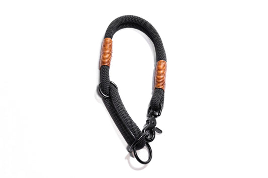 Handcrafted climbing rope and leather limited slip dog collar. High quality black hardware including a swivel trigger snap for easy handling. Custom sizing. Cross Winds Leather.