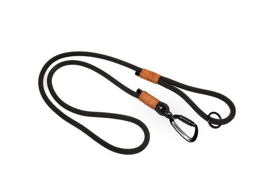 Handcrafted climbing rope and leather dog leash. Featuring high quality, heavy-duty black hardware, including a swivel auto-locking carabiner. Rope handle. Cross Winds Leather.