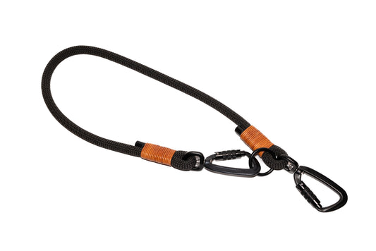 Handcrafted climbing rope and leather hand-free connector for dog walking. Featuring high quality black hardware, including swivel auto-locking carabiners. Cross Winds Leather.